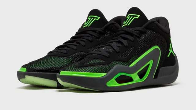 Side view of Jayson Tatum's black and green Jordan Brand sneakers.